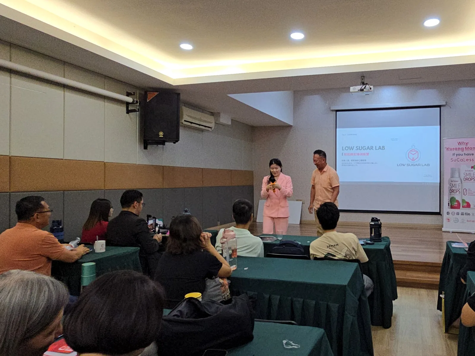 DCK business-school session with participants responding to the speaker