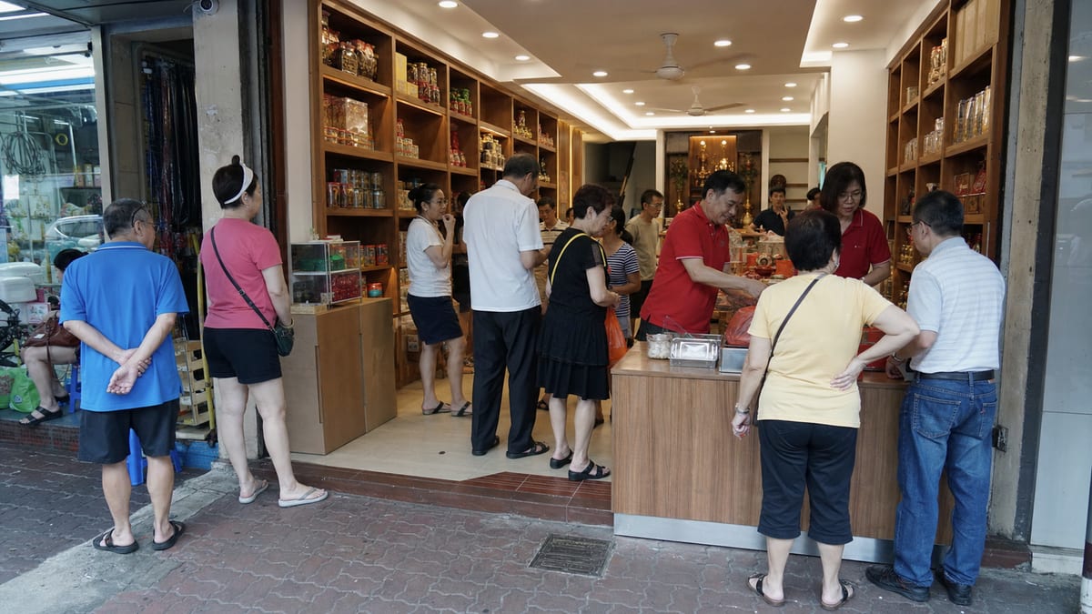 A contextual busy modern Klang shopfront with strong offline trade